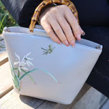 Design Style Bamboo-Handled Embroidered Handbag